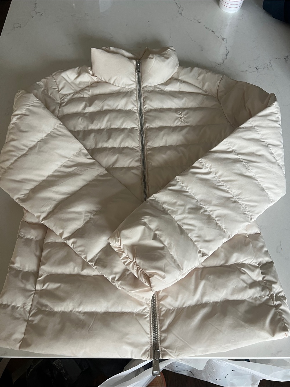 A true classic women’s polo puffer jacket size small worn once!